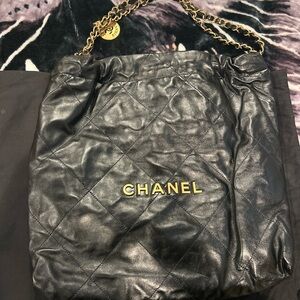 Chanel Quilted Black Shoulder Bag with Gold Accents